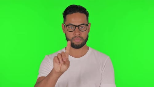 Rejecting Man Disliking Offer on Green Background