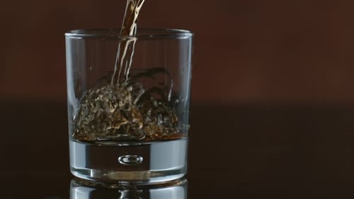 Whisky Is Poured Into Glass in ; on Phantom Flex