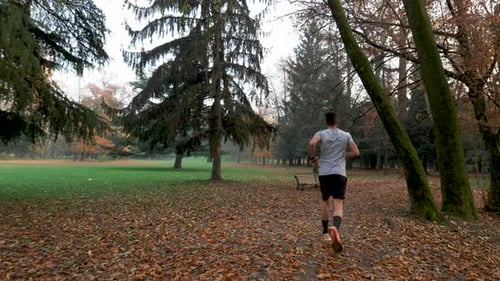 Slow Motion Man Running on a Countryside Trail