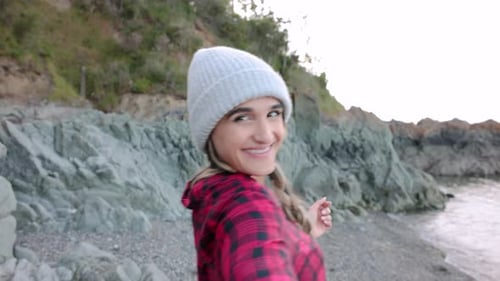 POV Happy Young Woman Leading on Ocean Beach 2529 Years