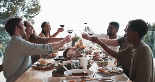 Group of Friends Toasting at Meal