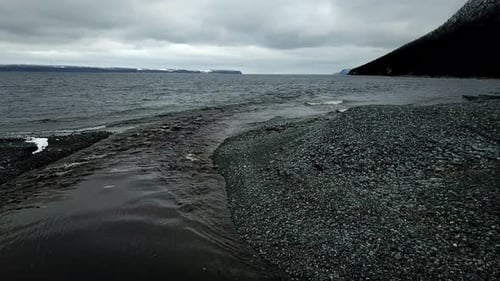 Scenic Pebble Beach and Ocean Coastline