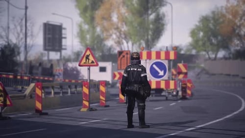 Construction Worker Managing Traffic in Urban Area During Daytime