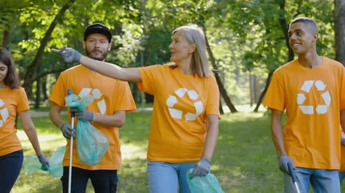 Volunteering Team Multiethnic Group of Eco Activists Supporting Ecology Walking in Forest for