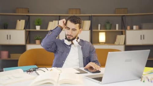 Man experiencing work stress.
