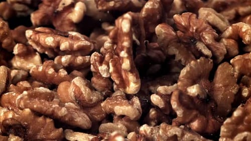 Walnut Halves Falling in Slow Motion