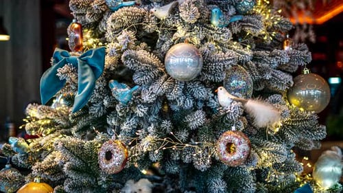 Festive Christmas Tree Decorated with Ornaments and Lights