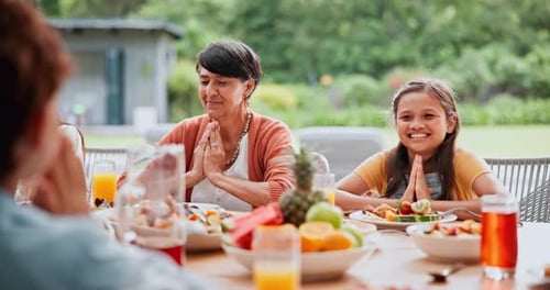Smiling People Eating and Laughing Together Outdoors