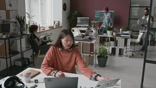 Timelapse of Female Software Developer Collaborating with Colleague
