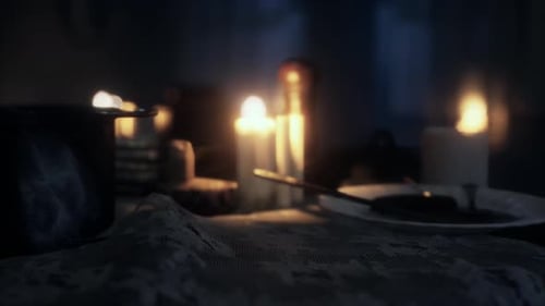 Flickering Candles and Lace Tablecloth for Atmospheric Background