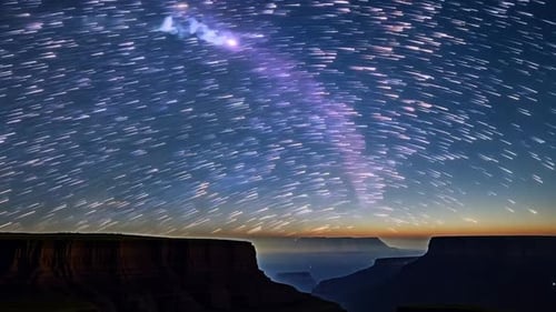 The Milky Way Galaxy Moving Over the Mountain Ridge Starry Night