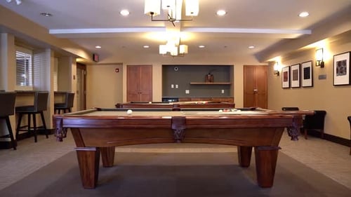 Two Pool Tables in Game Room