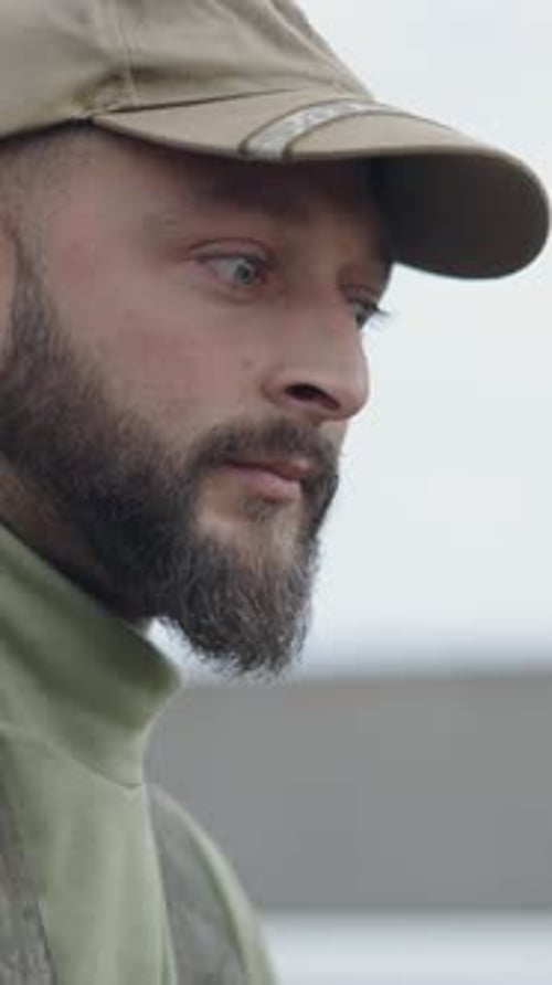 Close Up of Bearded Man Wearing a Cap