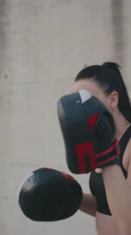 Woman Exercising and Boxing Outside