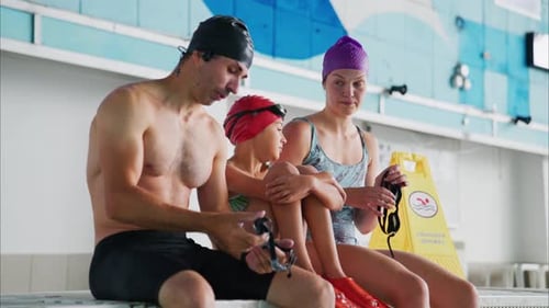 Family Bonding at the Swimming Pool A Relaxing Moment of Preparation Before Diving Into the Water