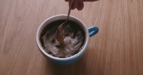 Pouring Black Coffee in Cup Top View of Coffee Pour Into Cup Coffee Break Top View of Man Stirring