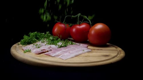 Fresh Ingredients: Bacon, Tomatoes, Parsley on Wood