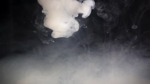Flowing White Smoke on Dark Background