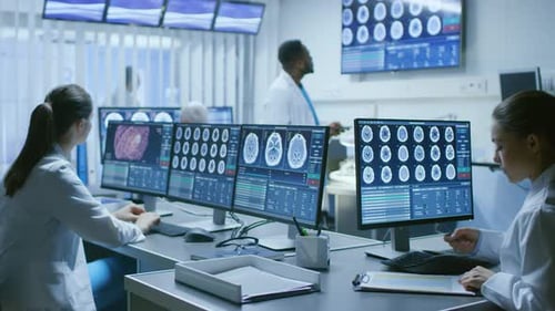 Medical Team Analyzing Brain Scans in Research Lab