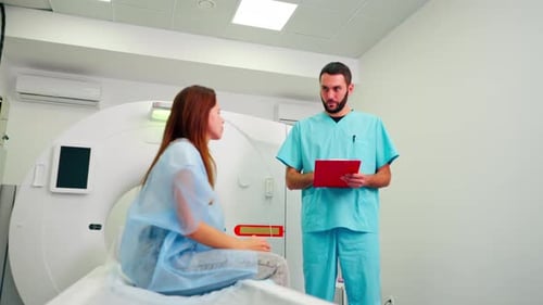 Woman Talks to Doctor Before Medical Scan