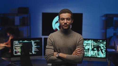 Young Programmer Working in Cybersecurity Office