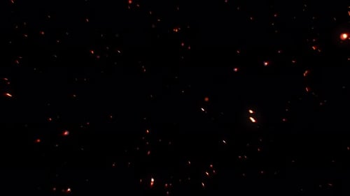 Bright Flying Sparks of Particles on a Black Background