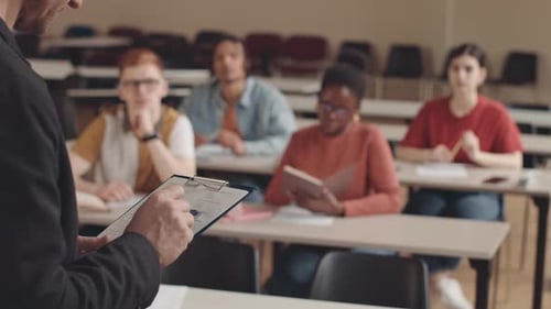 University Professor Giving Lecture to Students