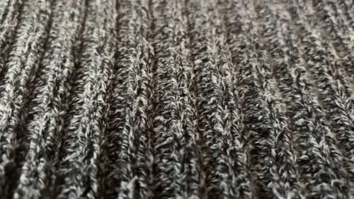 Close Up of Grey Knitted Fabric Texture