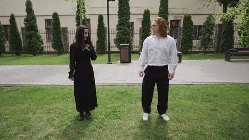 A Joyful Video of a Couple Dancing in a Beautiful Park Sharing Love