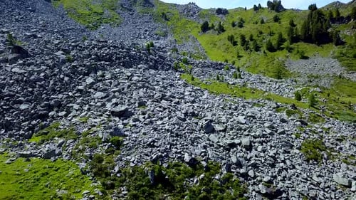 Aerial drone 4K panoramic footage of a mountain landscape over a lake
