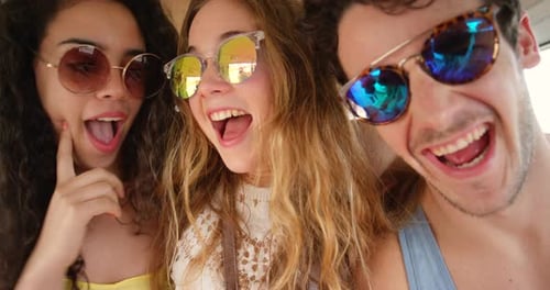 Friends, road trip and selfie in van for holiday, vacation and weekend getaway in sunglasses