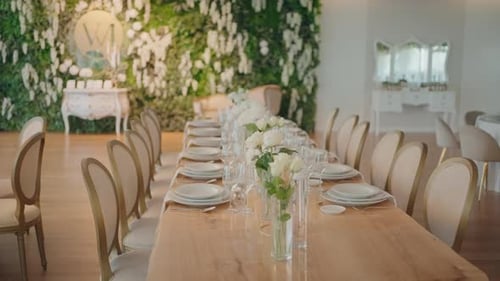 Elegant Wedding Reception Table Setting with Floral Decor
