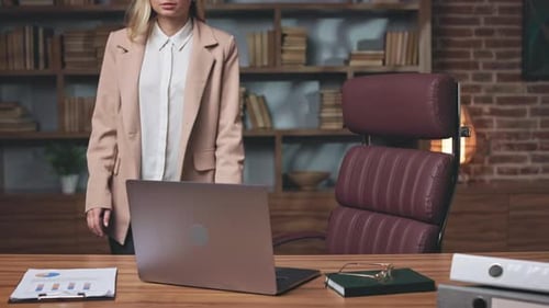 Female Company Owner Coming Back to Work in Office