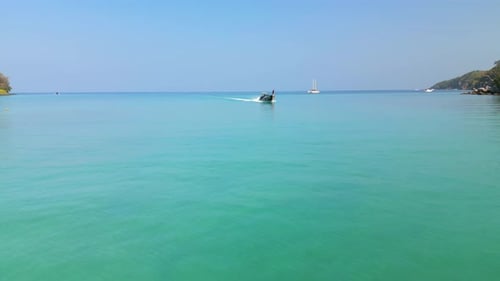 Aerial Of Wooden Thai Boat In The Turquoise Waters Of Phi Phi Island Thailand