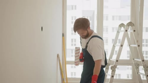 Stylish Man Frustrated Doing Home Improvement