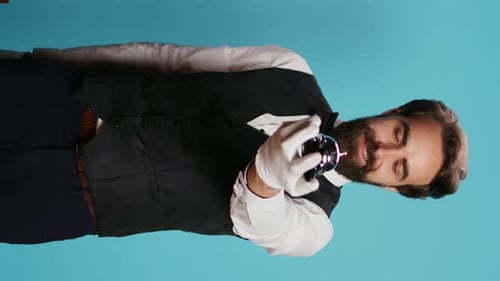 Man ringing metal bell