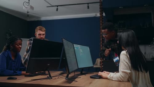 Software Testers Team Working in Office African and Caucasian People Diverse and Multiethnic Team