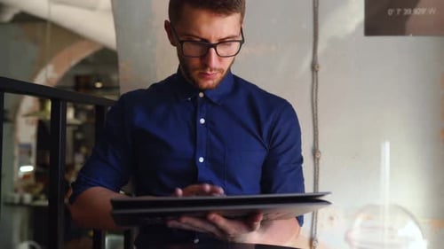 Freelancer Man Transforms Convertible Laptop to Tablet Mode and Works with Touchscreen Digital