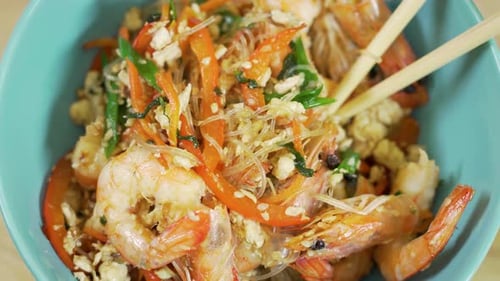 Shrimp and Noodle Stir Fry Bowl with Chopsticks