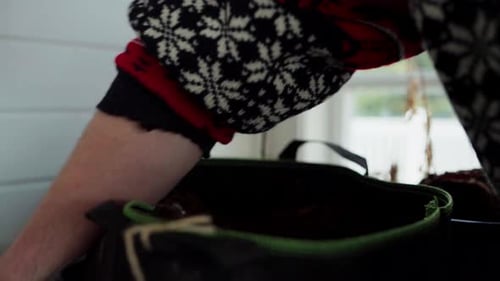 Hands Of Gardener Putting Soil On Pots - Close Up