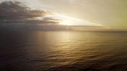 A sunset is the sun's fiery kiss to the night