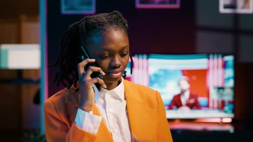African American Student Answering Call on Mobile Phone Line
