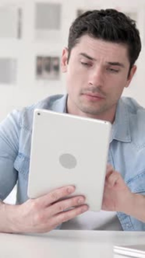Casual Young Man Upset by Business Loss, Vertical Video