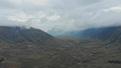 View of the savanna and green grass in the teletabies hill area of bromo