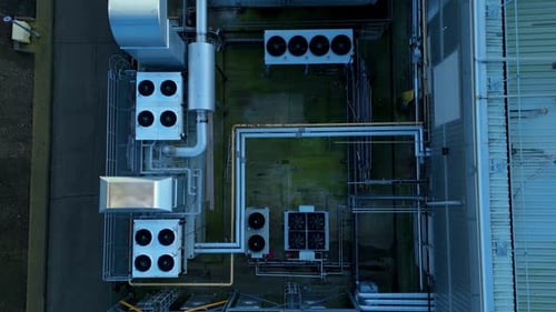 Aerial view of industrial rooftop equipment, United Kingdom.
