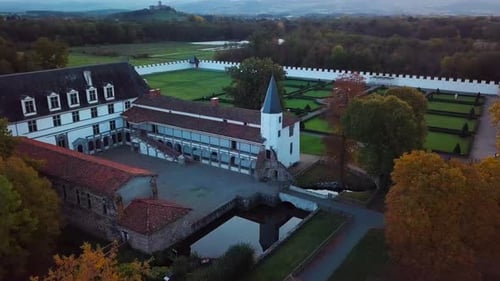 aerial shot over the Batie d'Urfe Castle during fall in Saint Etienne le Molard within the province