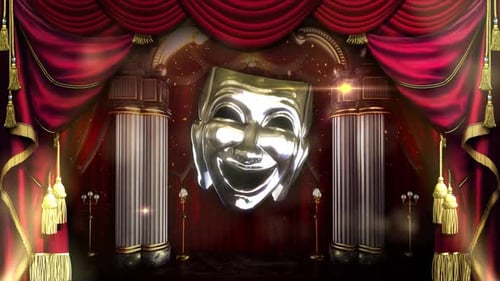 Ornate Rotating Theatre Masks On Stage