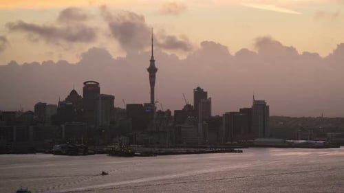 Sunset Time Lapse - Auckland Sky Tower and Harbour in Auckland, New Zealand. Auckland Skyline