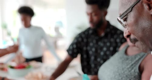 Family Gathering Around Kitchen Island During the Daytime