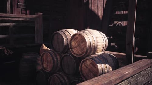Dynamic Lighting on Stacked Rustic Wooden Barrels